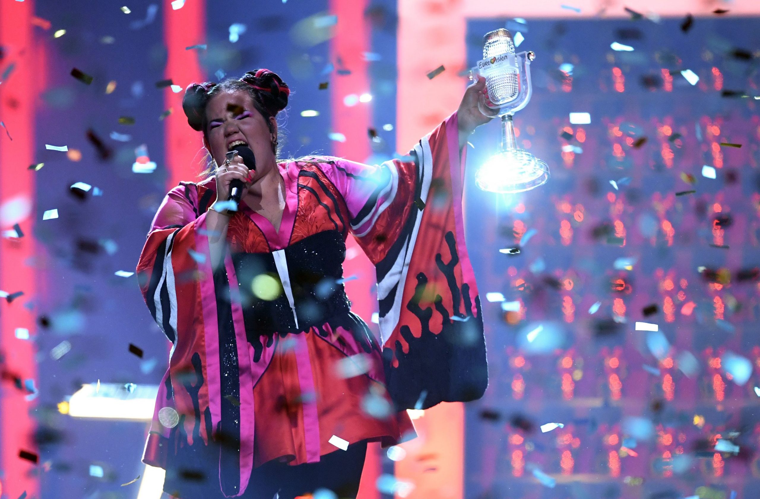 TOPSHOT - Israel's singer Netta Barzilai aka Netta performs with the trophy after winning the final of the 63rd edition of the Eurovision Song Contest 2018 at the Altice Arena in Lisbon, on May 12, 2018. (Photo by Francisco LEONG / AFP)        (Photo credit should read FRANCISCO LEONG/AFP/Getty Images)